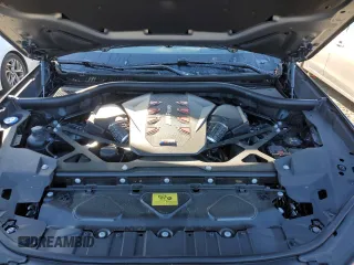 2024 BMW X6 M with VIN 5YM23ET0XR9U26576, listed as a Copart auction lot 86698164 with 6,669 mi miles and Salvage Title. Bid and sale history available at carsss.com. Image 14.