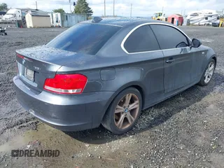 2013 BMW 1 Series 128i with VIN WBAUP7C5XDVP24796, listed as a IAAI auction lot 41807533 with 157,614 mi miles and . Bid and sale history available at carsss.com. Image 4.