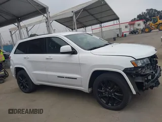 2017 Jeep Grand Cherokee Laredo with VIN 1C4RJEAG9HC805132, listed as a IAAI auction lot 42034175 with 120,949 mi miles and . Bid and sale history available at DreamBid. Image 14.
