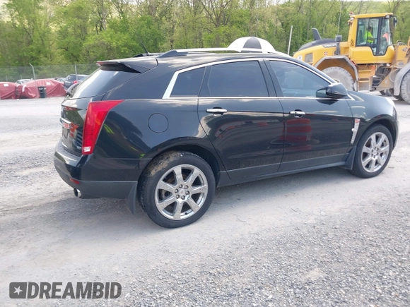 2012 Cadillac SRX Performance Collection with VIN 3GYFNEE32CS512118, listed as a IAAI auction lot 42158452 with 143,449 mi miles. Bid and sale history available at carsss.com. Image 4.