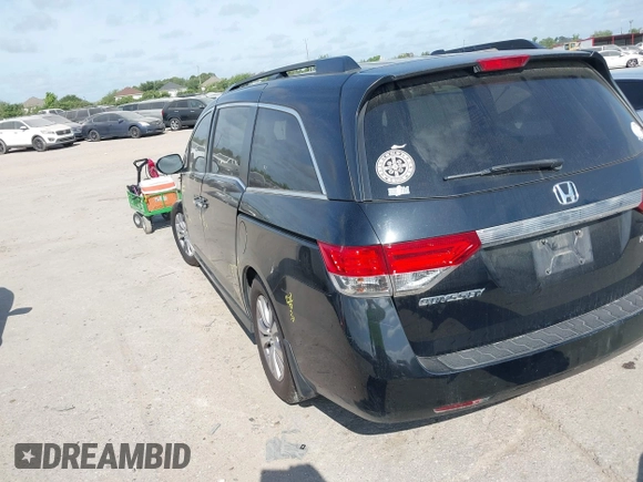 2015 Honda Odyssey EX-L with VIN 5FNRL5H68FB094983, listed as a IAAI auction lot 42031539 with 231,144 mi miles and . Bid and sale history available at DreamBid. Image 3.