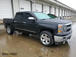 2014 Chevrolet Silverado 1500 LTZ with VIN 3GCUKSEC7EG553841, listed as a Copart auction lot 44797175 with 206,227 mi miles and Salvage Title. Bid and sale history available at carsss.com. Image 4.