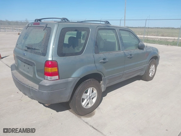 2007 Ford Escape XLS with VIN 1FMYU92Z77KB08603, listed as a IAAI auction lot 41858410 with 144,830 mi miles. Bid and sale history available at carsss.com. Image 4.
