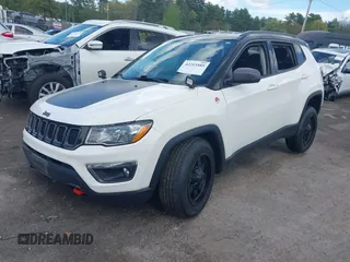 2020 Jeep Compass Trailhawk with VIN 3C4NJDDBXLT189303, listed as a IAAI auction lot 42215585 with 51,453 mi miles and . Bid and sale history available at DreamBid. Image 2.