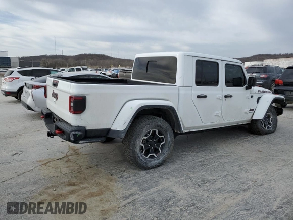 2020 Jeep Gladiator Rubicon z VIN 1C6JJTBG3LL156802, wystawiony jako Copart lot #48904865 z przebiegiem 30 704 mil mil oraz Szkoda całkowita • Salvage title. Historia ofert i sprzedaży dostępna na DreamBid. Obrazek 3.