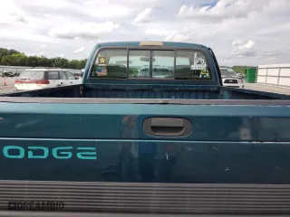1995 Dodge Ram 1500 with VIN 1B7HC16Y6SS382748, listed as a Copart auction lot 64548214 with 148,641 mi miles and Salvage Title. Bid and sale history available at carsss.com. Image 10.