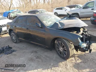 2014 Chrysler 300 with VIN 2C3CCAGT6EH209437, listed as a IAAI auction lot 41780106 with 153,414 mi miles. Bid and sale history available at carsss.com. Image 1.