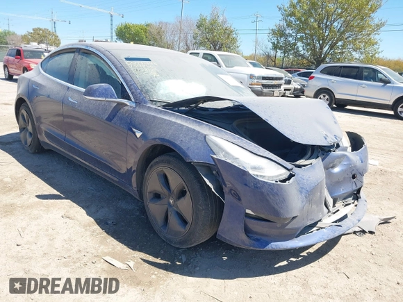 2020 Tesla Model 3 Standard Range Plus z VIN 5YJ3E1EA2LF739866, wystawiony jako IAAI lot #41842179 z przebiegiem 70 089 mil mil oraz . Historia ofert i sprzedaży dostępna na DreamBid. Obrazek 1.