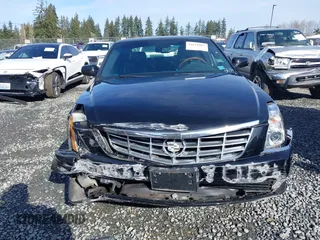 2006 Cadillac DTS 1SC z VIN 1G6KD57YX6U100634, wystawiony jako IAAI lot #41671007 z przebiegiem Nie podano mil oraz . Historia ofert i sprzedaży dostępna na DreamBid. Obrazek 12.