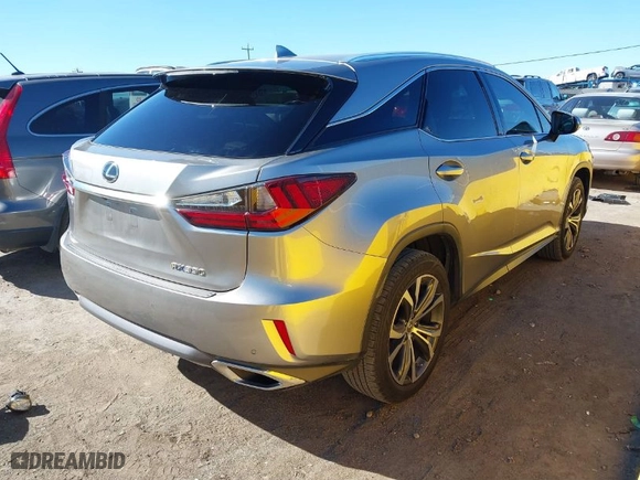 2017 Lexus RX with VIN 2T2BZMCA2HC057453, listed as a IAAI auction lot 41870405 with 70744 miles. Bid and sale history available at carsss.com. Image 4.