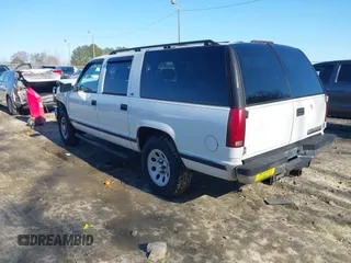 1996 Chevrolet Suburban with VIN 3GNFK16RXTG135350, listed as a IAAI auction lot 41482918 with 157,971 mi miles. Bid and sale history available at carsss.com. Image 3.