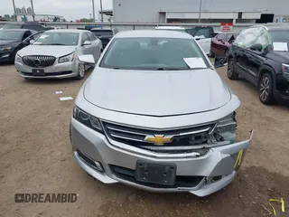 2014 Chevrolet Impala LT with VIN 2G1125S33E9101056, listed as a IAAI auction lot 41877161 with 130,757 mi miles and . Bid and sale history available at DreamBid. Image 13.