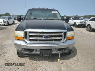 2001 Ford F-350 XL with VIN 1FTSX31F11ED72055, listed as a Copart auction lot 66164624 with 228,597 mi miles and Salvage Title. Bid and sale history available at DreamBid. Image 5.