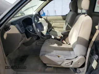 2000 Nissan Frontier XE z VIN 1N6ED26T5YC313494, wystawiony jako Copart lot #46549935 z przebiegiem 271 425 mil mil oraz Szkoda całkowita • Salvage title. Historia ofert i sprzedaży dostępna na DreamBid. Obrazek 7.