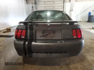 2003 Ford Mustang Standard z VIN 1FAFP404X3F342630, wystawiony jako Copart lot #66846924 z przebiegiem 191 297 mil mil oraz Szkoda całkowita • Salvage title. Historia ofert i sprzedaży dostępna na DreamBid. Obrazek 6.