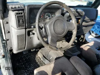 1997 Jeep Wrangler Sport with VIN 1J4FY19S0VP453959, listed as a Copart auction lot 44560295 with 182,464 mi miles and Salvage Title. Bid and sale history available at carsss.com. Image 8.