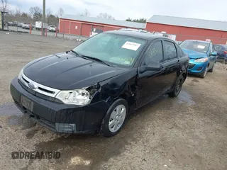 2010 Ford Focus S with VIN 1FAHP3EN5AW232831, listed as a IAAI auction lot 41865007 with 244,453 mi miles. Bid and sale history available at carsss.com. Image 2.
