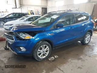 2018 Ford Escape SE z VIN 1FMCU9GD1JUB80500, wystawiony jako IAAI lot #41613294 z przebiegiem 112 187 mil mil oraz . Historia ofert i sprzedaży dostępna na DreamBid. Obrazek 17.