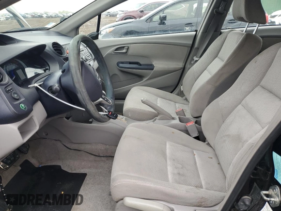 2010 Honda Insight LX with VIN JHMZE2H56AS022299, listed as a Copart auction lot 54872215 with 149,514 mi miles and Salvage title. Bid and sale history available at DreamBid. Image 7.