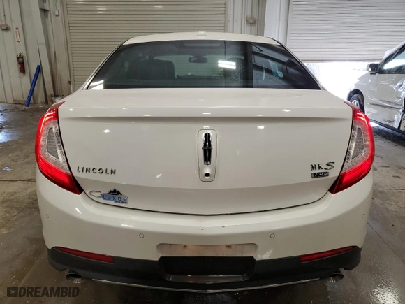 2014 Lincoln MKS with VIN 1LNHL9EK2EG605964, listed as a Copart auction lot 51810195 with 102,850 mi miles and Non Repairable. Bid and sale history available at carsss.com. Image 6.