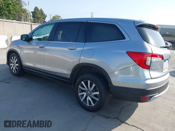 2021 Honda Pilot EX with VIN 5FNYF5H37MB014384, listed as a IAAI auction lot 42412500 with 36,934 mi miles and . Bid and sale history available at DreamBid. Image 3.