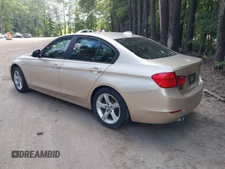 2013 BMW 3 Series 328i xDrive with VIN WBA3B5G53DNP40721, listed as a IAAI auction lot 42614545 with 102,570 mi miles and . Bid and sale history available at DreamBid. Image 3.