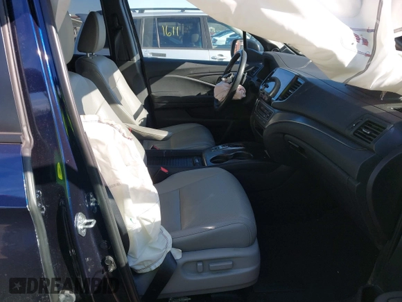2023 Honda Passport EX-L with VIN 5FNYF8H51PB028045, listed as a IAAI auction lot 41609342 with 52,920 mi miles and . Bid and sale history available at DreamBid. Image 5.