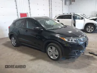 2020 Honda HR-V EX with VIN 3CZRU6H59LM737305, listed as a IAAI auction lot 41679197 with 76,670 mi miles. Bid and sale history available at carsss.com. Image 1.