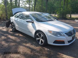 2012 Volkswagen CC Sport PZEV with VIN WVWMP7AN5CE543495, listed as a IAAI auction lot 42150948 with 100,984 mi miles. Bid and sale history available at carsss.com. Image 1.