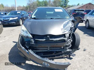 2014 Toyota Prius One with VIN JTDKDTB31E1568233, listed as a IAAI auction lot 42132907 with 96,093 mi miles and . Bid and sale history available at DreamBid. Image 12.