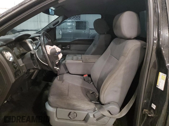 2012 Ford F-150 XL with VIN 1FTMF1EF6CFB12791, listed as a Copart auction lot 57132145 with 206,525 mi miles and Salvage title. Bid and sale history available at DreamBid. Image 7.
