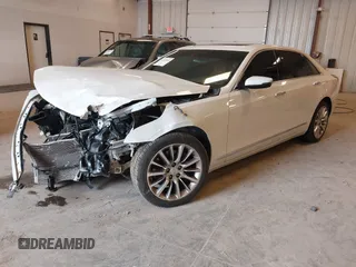 2017 Cadillac CT6 Luxury AWD z VIN 1G6KD5RS9HU203376, wystawiony jako IAAI lot #42181002 z przebiegiem Nie podano mil oraz . Historia ofert i sprzedaży dostępna na DreamBid. Obrazek 2.