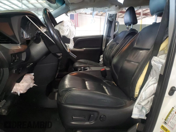 2015 Toyota Sienna SE with VIN 5TDXK3DC8FS662302, listed as a Copart auction lot 57995425 with 181,379 mi miles and Salvage title. Bid and sale history available at DreamBid. Image 7.