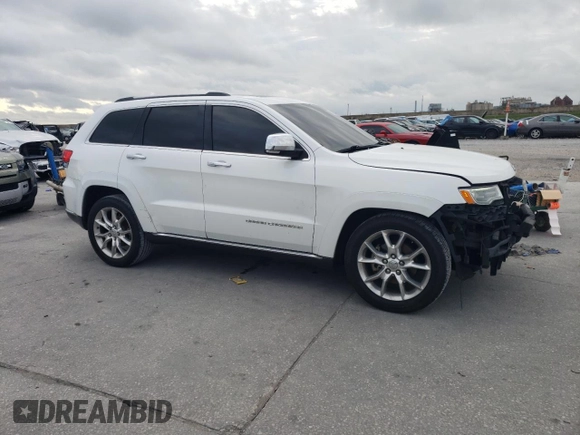 2015 Jeep Grand Cherokee Summit with VIN 1C4RJEJG8FC131925, listed as a Copart auction lot 55270785 with 130,425 mi miles and Salvage title. Bid and sale history available at DreamBid. Image 4.