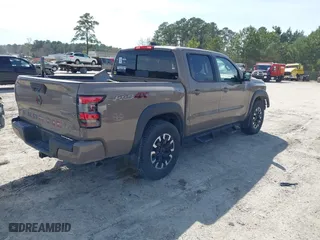 2023 Nissan Frontier PRO-4X with VIN 1N6ED1EKXPN620732, listed as a IAAI auction lot 41839561 with 27,496 mi miles. Bid and sale history available at carsss.com. Image 4.