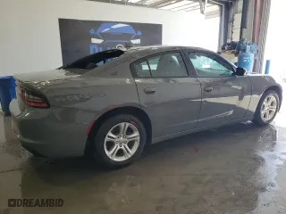 2023 Dodge Charger SXT with VIN 2C3CDXBG2PH587879, listed as a Copart auction lot 54262165 with 60,663 mi miles and Salvage Title. Bid and sale history available at carsss.com. Image 3.