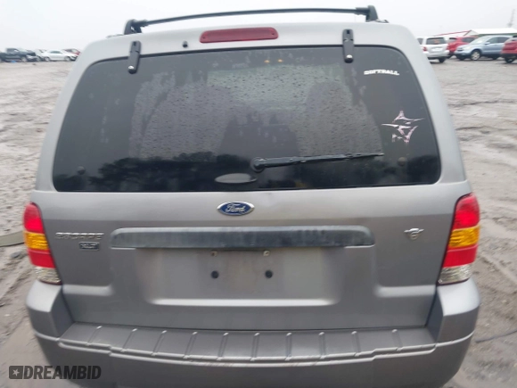 2007 Ford Escape XLT with VIN 1FMYU03177KB90563, listed as a IAAI auction lot 41566335 with 166,233 mi miles. Bid and sale history available at carsss.com. Image 16.