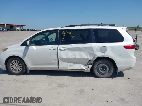 2015 Toyota Sienna XLE with VIN 5TDYK3DCXFS663083, listed as a IAAI auction lot 41967621 with 177,472 mi miles and . Bid and sale history available at DreamBid. Image 14.