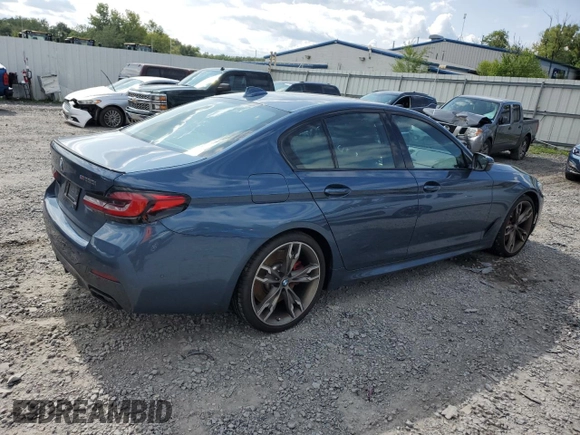2023 BMW 5 Series M550i xDrive z VIN WBA13BK02PCN82953, wystawiony jako Copart lot #68124264 z przebiegiem 10 010 mil mil oraz Szkoda całkowita • Salvage title. Historia ofert i sprzedaży dostępna na DreamBid. Obrazek 3.