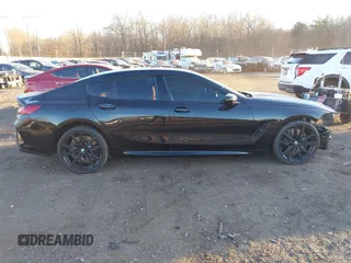 2024 BMW 8 Series M850i with VIN WBAGV8C00RCN95483, listed as a IAAI auction lot 41294811 with 1 mi miles. Bid and sale history available at carsss.com. Image 13.