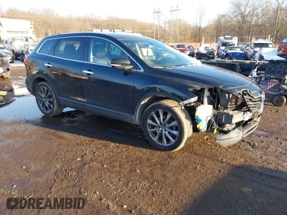 2014 Mazda CX-9 Grand Touring with VIN JM3TB3DV4E0444558, listed as a IAAI auction lot 41538130 with 113,050 mi miles and . Bid and sale history available at DreamBid. Image 1.