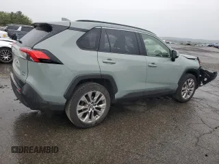 2021 Toyota RAV4 XLE Premium with VIN JTMA1RFV0MD074834, listed as a Copart auction lot 58466965 with 71,623 mi miles and Salvage title. Bid and sale history available at DreamBid. Image 3.