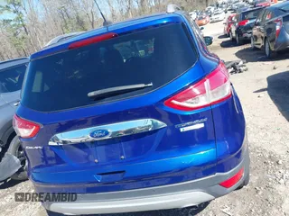 2015 Ford Escape Titanium with VIN 1FMCU0J93FUC20745, listed as a IAAI auction lot 41781551 with 174,538 mi miles and . Bid and sale history available at DreamBid. Image 17.