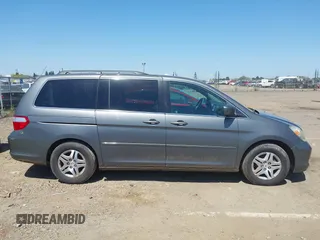 2007 Honda Odyssey EX-L z VIN 5FNRL38797B137595, wystawiony jako IAAI lot #42002233 z przebiegiem 192 296 mil mil oraz . Historia ofert i sprzedaży dostępna na DreamBid. Obrazek 13.