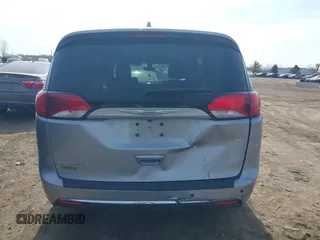 2018 Chrysler Pacifica Touring L with VIN 2C4RC1BG7JR101736, listed as a IAAI auction lot 41776231 with 90,487 mi miles and . Bid and sale history available at DreamBid. Image 16.