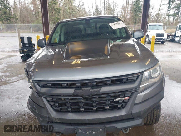 2018 Chevrolet Colorado 4WD ZR2 with VIN 1GCGTEEN9J1325135, listed as a IAAI auction lot 41869769 with 77,327 mi miles. Bid and sale history available at carsss.com. Image 12.