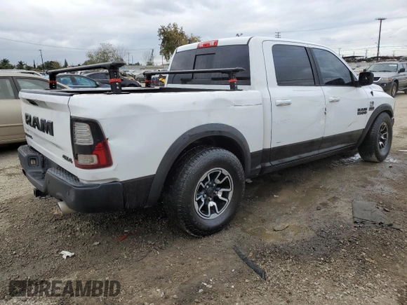2018 Ram 1500 Rebel with VIN 1C6RR7YT7JS235965, listed as a Copart auction lot 84749674 with 61,484 mi miles and Salvage title. Bid and sale history available at DreamBid. Image 3.