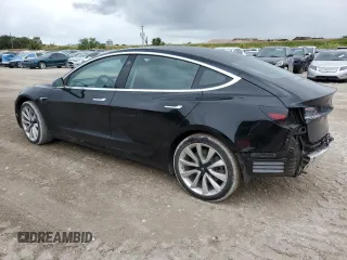 2019 Tesla Model 3 Mid Range with VIN 5YJ3E1EA7KF412426, listed as a Copart auction lot 55204205 with 73,230 mi miles and Non Repairable. Bid and sale history available at DreamBid. Image 2.