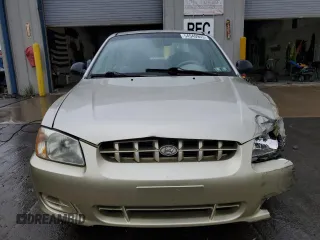 2002 Hyundai Accent GL z VIN KMHCG45C12U355561, wystawiony jako Copart lot #54546945 z przebiegiem 22 893 mil mil oraz Szkody całkowita. Historia ofert i sprzedaży dostępna na DreamBid. Obrazek 5.