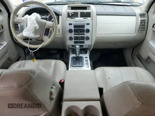 2008 Mercury Mariner Premier z VIN 4M2CU97188KJ41798, wystawiony jako Copart lot #43960565 z przebiegiem 154 302 mil mil oraz Szkody całkowita. Historia ofert i sprzedaży dostępna na DreamBid. Obrazek 8.